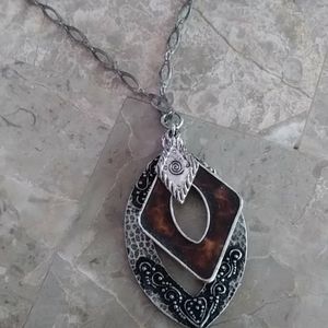 Antique silver colored vintage pendant
